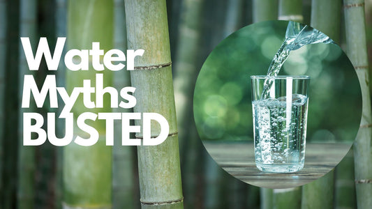 Water being poured into a glass from a natural water filter water jug