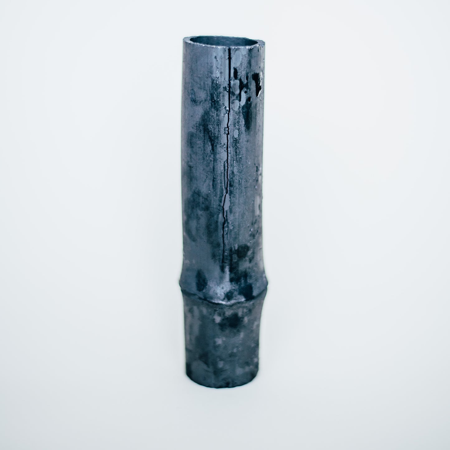 Charcoal water filter on white background
